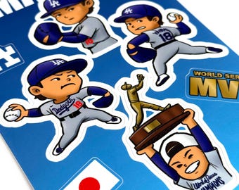 May include: A sheet of stickers featuring cartoon baseball players in blue and grey uniforms. The stickers include the text "Dodgers", "World Series", and Japanese text. One sticker shows a player holding a trophy.