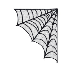 Op de afbeelding: Zwart-witte geborduurde patch van een spinnenweb in een hoekontwerp.