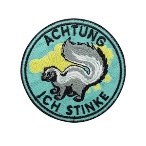 Strykmärke: Varning: Jag stinker! Skunk | Roliga tygmärken, Humoristiska djurstrykmärken, Roliga babytygmärken, Fistygmärken, Äntligen hemma