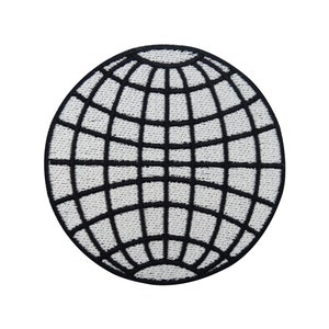 May include: Black and white embroidered patch of a globe with a grid pattern.