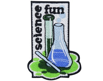 May include: An embroidered patch with a green, white, and blue science beaker and test tube. The text "science fun" is written vertically on the left side of the patch.