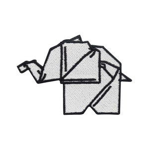 May include: White origami elephant patch with black stitching. The patch is made of fabric and has a white background with black outlines.