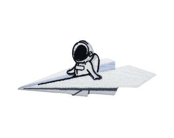 Iron-on patch astronaut on paper airplane | Funny space patches, alien iron-on patches, NASA patches, UFO patches for clothes