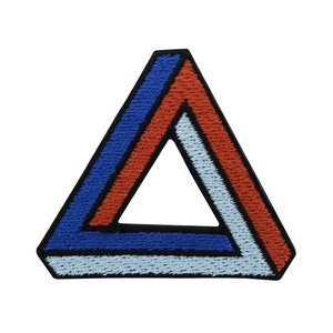 May include: A red, blue and white embroidered triangle patch with a black outline. The triangle is a three-dimensional optical illusion.