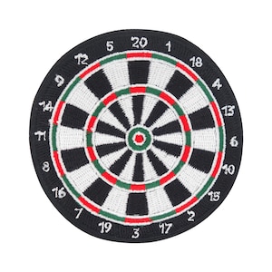May include: A black and white dartboard with red and green rings around the bullseye. The numbers 1 through 20 are printed around the outer edge of the board.