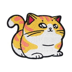 May include: Embroidered iron-on patch of a cartoon cat with yellow and pink fur, white belly, and black eyes. The cat is sitting with its tail curled around its body.