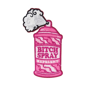 May include: Pink spray can patch with the text "Bitch Spray Repellent" in white. The patch has a cartoon-style design with a cloud of pink smoke coming out of the can.