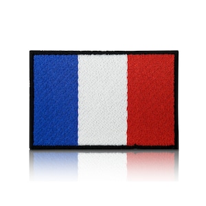 May include: A blue, white, and red embroidered patch with a black border, depicting the French flag.