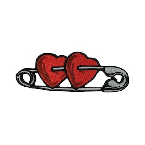 May include: An embroidered iron-on patch featuring two red hearts connected by a silver safety pin.