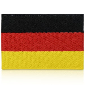 May include: A black, red and yellow fabric patch with the colours arranged in horizontal stripes. The patch is a representation of the German flag.
