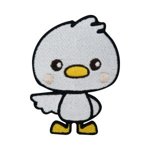 May include: White embroidered iron-on patch of a cartoon duck with yellow beak and feet.