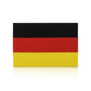 May include: A rectangular patch displaying the German flag. The flag is composed of three horizontal stripes: black, red, and yellow. The patch is likely made of fabric and is a representation of the German national flag.