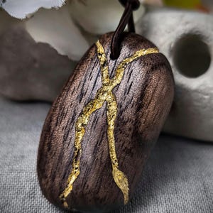 Eco-Friendly Kintsugi Jewelry: Wooden Necklace with 24k Gold Touch