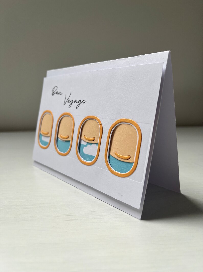 carte Bon Voyage à travers les hublots image 2