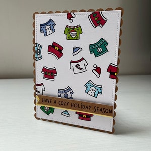 Carte pêle-mêle de pulls de noel
