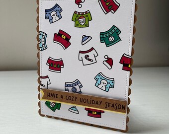 Carte pêle-mêle de pulls de noel
