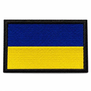 May include: Embroidered patch featuring the flag of Ukraine. The rectangular patch has a blue upper half and a yellow lower half, with a black border. The colors are vibrant and the stitching is detailed.