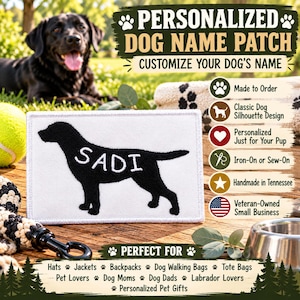 May include: A rectangular white fabric patch featuring a black embroidered silhouette of a Labrador retriever with the name SADI stitched in white letters. The patch includes text reading PERSONALIZED DOG NAME PATCH and CUSTOMIZE YOUR DOG'S NAME.