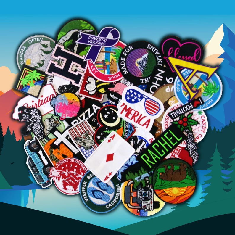 May include: A collection of colorful embroidered patches featuring various designs, including a heart with the word "blessed", a cross, a pizza slice, a crescent moon, a playing card, a bear, a palm tree, a mountain range, a car, a pair of flip flops, and a bee. The patches are arranged in a random pattern and are all different sizes.
