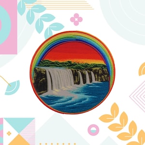 May include: A round embroidered patch featuring a rainbow arch over a waterfall scene. The waterfall is depicted in shades of grey and white, with a blue river flowing below. The background is a sunset with orange, red, and yellow hues.