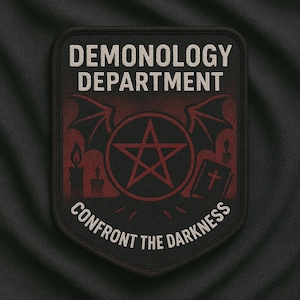 May include: A black and red patch with the words "Demonology Department" at the top and "Confront the Darkness" at the bottom. The design includes a pentagram, candles, wings, and a book with a cross.