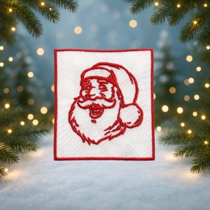 May include: A square, white fabric patch with a red embroidered Santa Claus face. The Santa face features a red hat, beard, and smiling mouth. The patch is framed with a red border, perfect for holiday crafts and decorations.