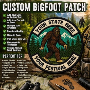May include: A circular embroidered patch featuring a brown Bigfoot creature walking through a forest with white mountains in the background. The patch has cream-colored borders with the black text "YOUR STATE HERE" and "YOUR FESTIVAL HERE".