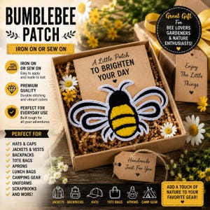 May include: A bumblebee patch with yellow and black embroidered stripes and white outlines, presented in a cardboard box on a bed of shredded paper. The patch is attached to a card with the text A Little Patch To Brighten Your Day.