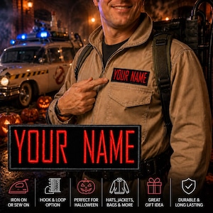 May include: A rectangular black fabric patch featuring the text YOUR NAME embroidered in bold red capital letters. The patch is shown both attached to a tan utility jacket and as a separate item, with a matching patch visible on the jacket.