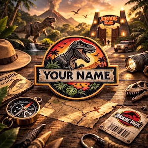 May include: A Jurassic Park-themed patch with a dinosaur design and the text "YOUR NAME" on a wooden surface. The image includes a compass, map, binoculars, and a dinosaur skull, evoking a sense of adventure and exploration.