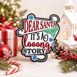 May include: A Christmas-themed patch with the text "DEAR SANTA, IT'S A LONG STORY" in red and white embroidery. The patch features snowflakes and holly accents, perfect for holiday crafts and decorations.