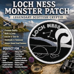 May include: A circular embroidered patch featuring a black background with white stitching. The design depicts a silhouette of the Loch Ness Monster emerging from water against a large moon, with a constellation above and the text LOCH NESS.