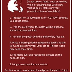 May include: A maroon and white instructional guide for iron-on patches. The guide includes instructions on preheating the iron, positioning the patch, and pressing for 30 seconds. The guide also includes a graphic of a bear fishing.