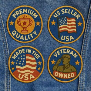 May include: Four circular embroidered patches on blue denim. Top left: trophy icon with text PREMIUM QUALITY. Top right: US flag with text US SELLER USA. Bottom left: US flag with text MADE IN THE USA. Bottom right: saluting soldier with text VETERAN OWNED.
