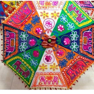 indian umbrella 
elephant umbrella 
embroidered umbrella 
indian handicrafts 
decorative parsols 
rajasthani umbrella 
umbrella for decoratio