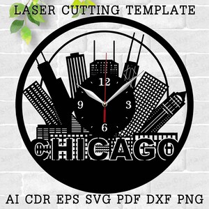 May include: Black and white laser cut design of the Chicago skyline with a clock face in the center. The clock face has black Roman numeral hour markers and black hands. The text "CHICAGO" is below the clock face.