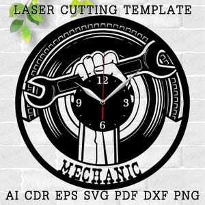 May include: Black and white laser cut clock design featuring a wrench and the word "MECHANIC".