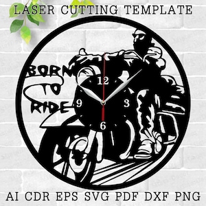 May include: Black and white laser cut clock design featuring a motorcycle rider with the words "Born to Ride" and clock numbers.