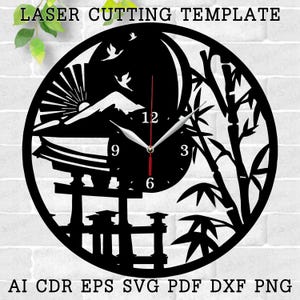 May include: Black and white laser cut clock design featuring a Japanese temple, bamboo, and birds. The clock face has Roman numeral markings.