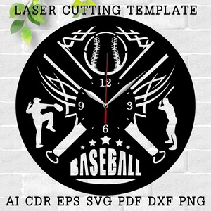 May include: Black and white laser cut clock design featuring a baseball, bats, and players. The clock face has Roman numeral markings and the words "BASEBALL" are printed below the clock face.