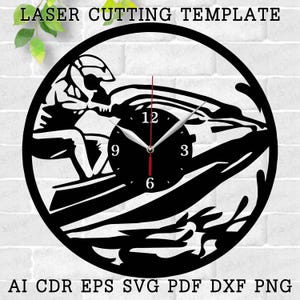 May include: Black and white laser cut clock design featuring a person riding a jet ski. The clock face is visible with numbers 12, 9, 3, and 6. The text "LASER CUTTING TEMPLATE" is at the top of the image. The text "AI CDR EPS SVG PDF DXF PNG" is at the bottom of the image.