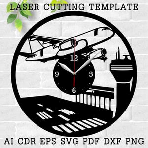 May include: Black and white laser cutting template of an aeroplane flying over a control tower and runway. The template includes a clock face with Roman numeral markings.