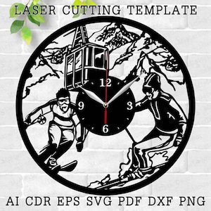 May include: Black and white laser cut clock design featuring two skiers on a mountain with a cable car and clock face. The clock face has Roman numerals and a black background.