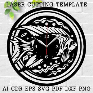 May include: Black laser-cut wall clock featuring a fish design within a circular frame. The clock face has a minimalist design with numbers at 12, 3, 6, and 9. The hands are silver and the second hand is red. The text "LASER CUTTING TEMPLATE" is at the top.