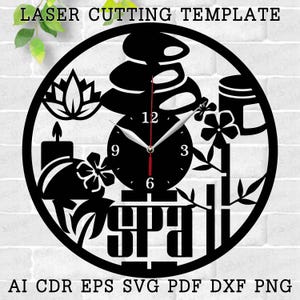 May include: Black and white laser cut clock design featuring a spa theme with a clock face, stones, flowers, and the word "SPA".