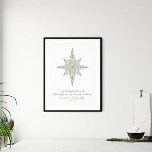 May include: A printable wall art design featuring a stylized star with a quote from John 8:12, "I am the light of the world. Whoever follows me will never walk in darkness, but will have the light of life."