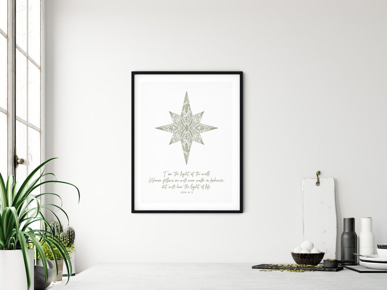 May include: A printable wall art design featuring a stylized star with a quote from John 8:12, "I am the light of the world. Whoever follows me will never walk in darkness, but will have the light of life."