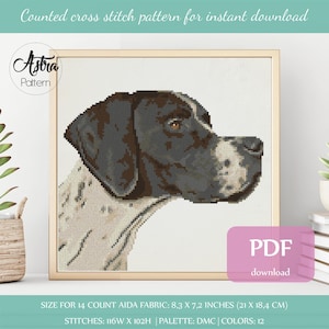 May include: Counted cross stitch pattern for a dog's head. The dog is a black and white pointer with brown eyes. The pattern is for 14 count Aida fabric and measures 8.3 inches by 7.2 inches. The pattern uses 12 colors and is available for instant download as a PDF.