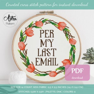May include: A counted cross stitch pattern featuring a wreath of pink tulips with the text "PER MY LAST EMAIL" in brown lettering. The pattern is designed for 14 count Aida fabric and measures 9.5 inches by 9.5 inches. The pattern includes 9 colors and is available for instant download as a PDF.