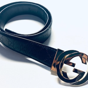 Gucci belt Black &  gold with interlocking G buckles